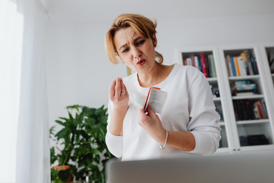 Surprised woman holding receipts showing the cost of per-seat scheduling tools