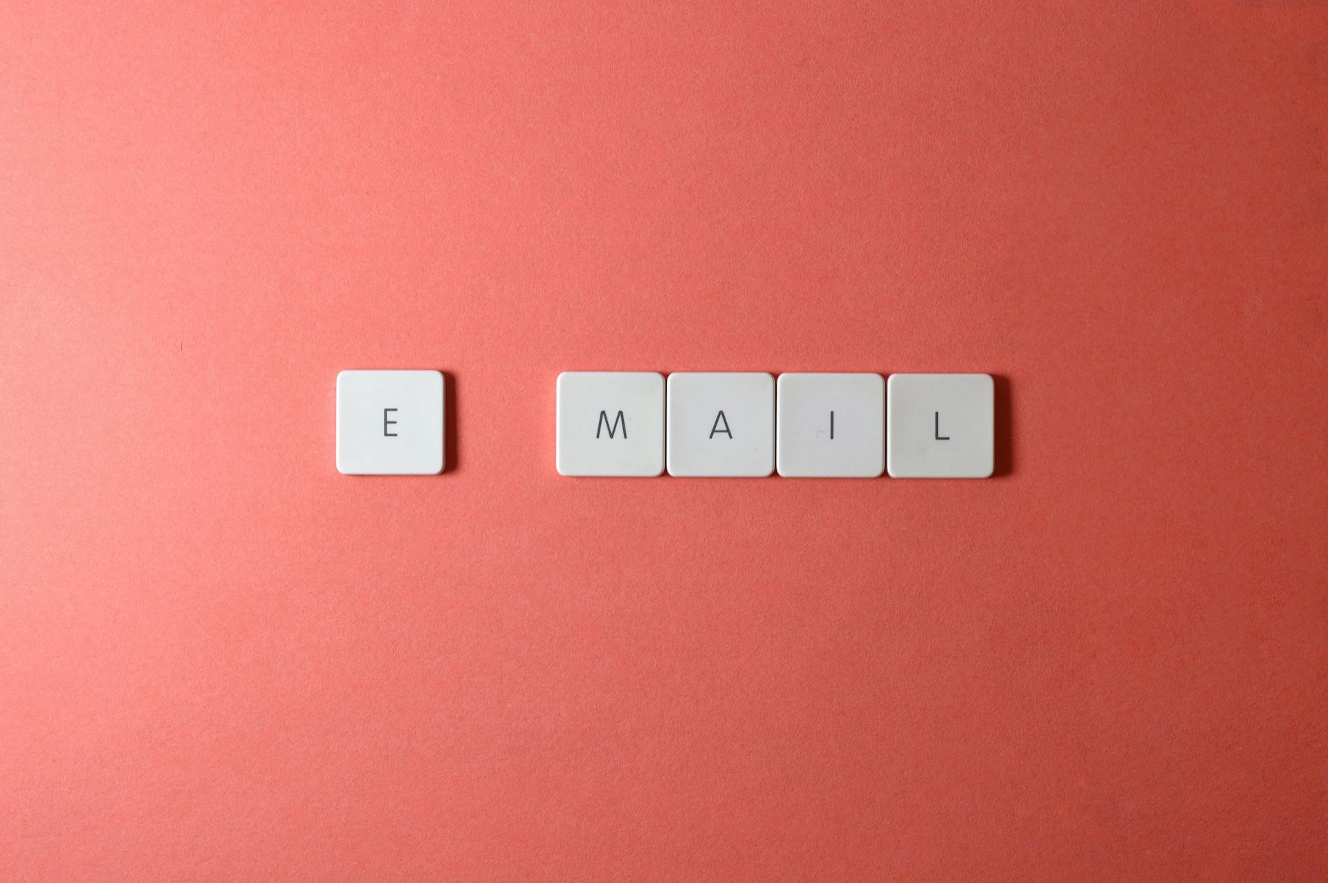 Email keyboard letters emphasizing email communication restrictions