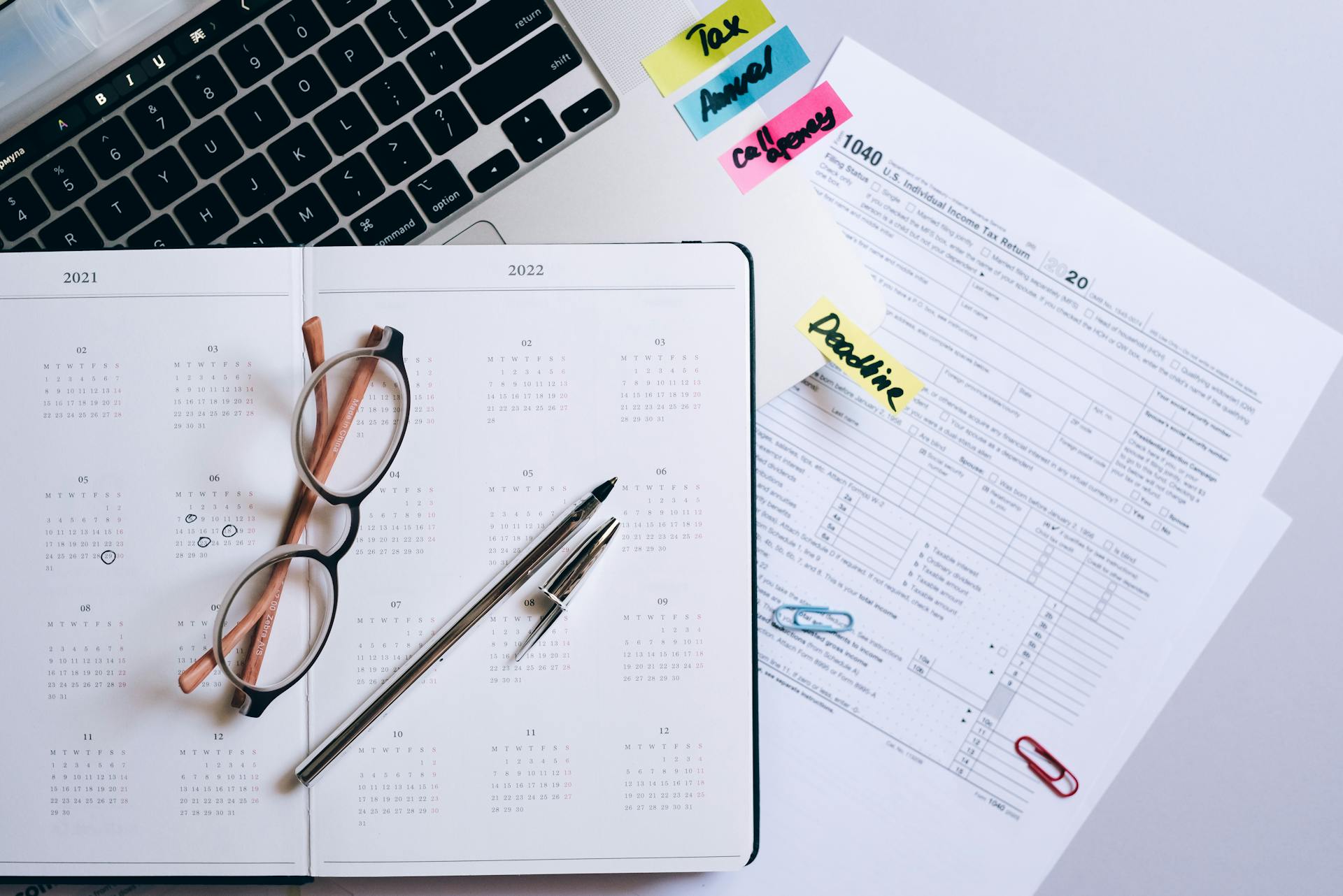Calendar and planning workspace with laptop