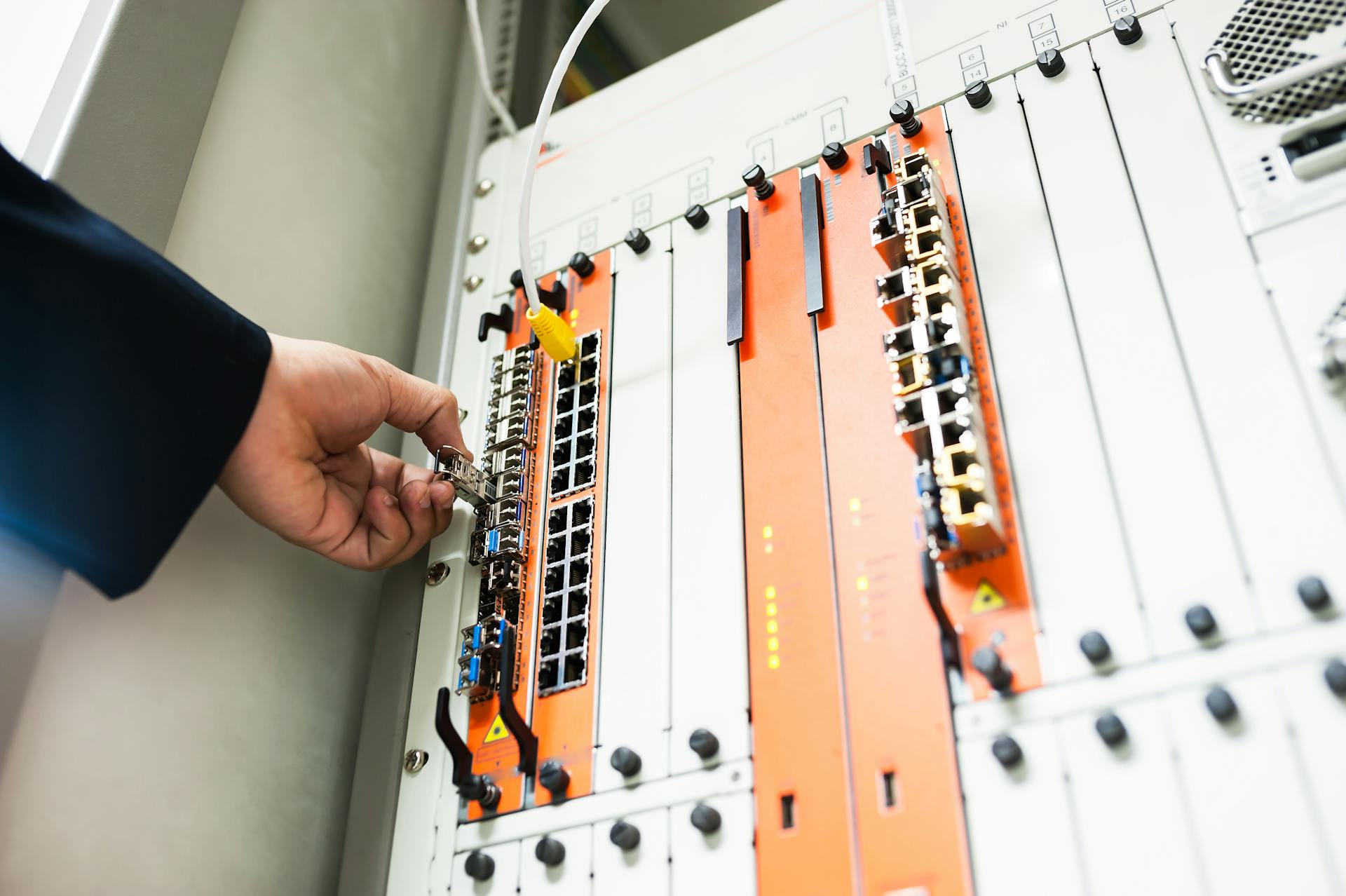 Engineer working on server infrastructure in data center
