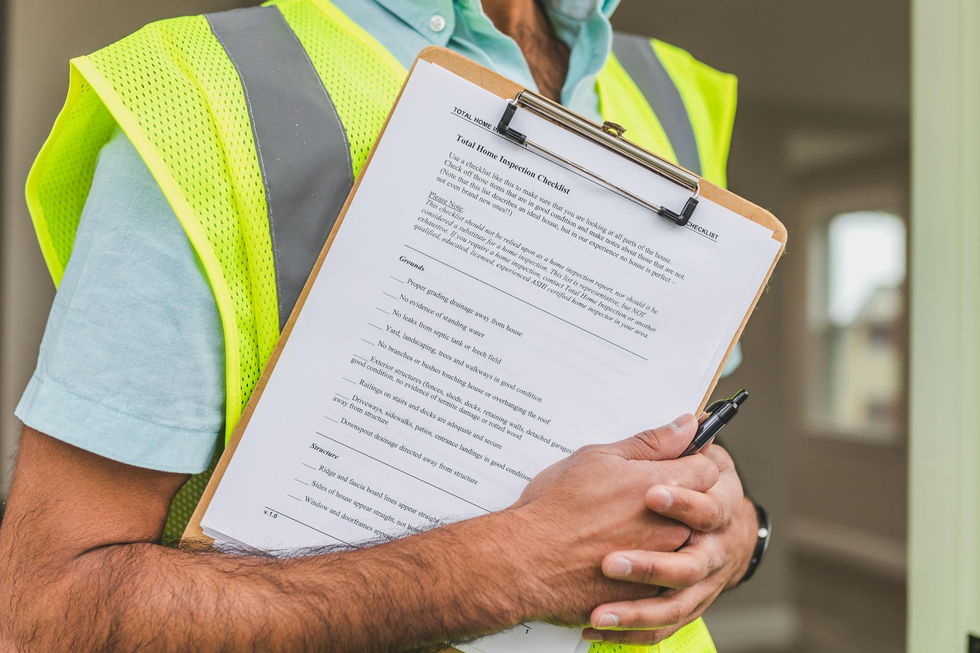 Professional reviewing checklist for security audit